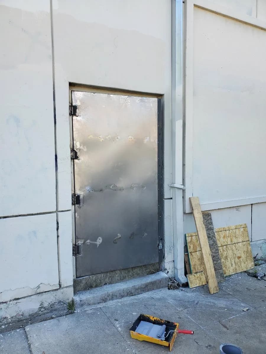 picture of a metal door installed by Faithful Door Solutions